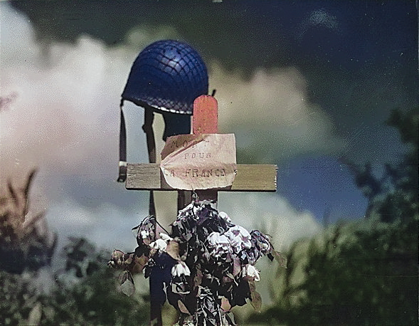 Tribute to a killed American soldier erected by French civilians, Carentan, France, 17 Jun 1944 [Colorized by WW2DB]