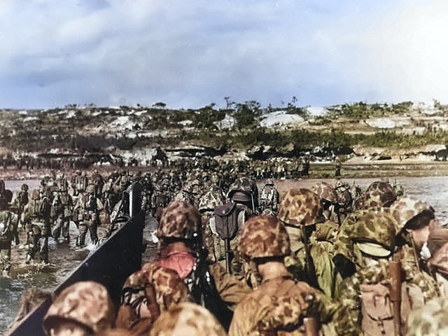 Men of the US 10th Army landing on Okinawa, Japan, 1 Apr 1945 [Colorized by WW2DB]