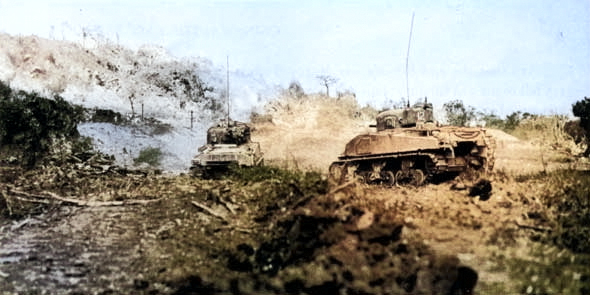 M4 Sherman tanks of US 769th Tank Battalion moving toward Hill 89 on Okinawa, Japan, mid-Jun 1945 [Colorized by WW2DB]