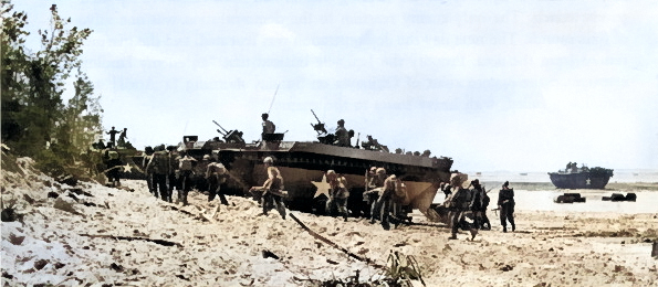 US Army soldiers disembarking from LVTs onto Okinawa beach, Japan, circa Apr 1945 [Colorized by WW2DB]