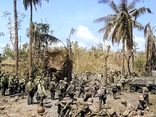 American troops and equipment on a Leyte, Philippine Islands beachhead, 20 Oct 1944 [Colorized by WW2DB]