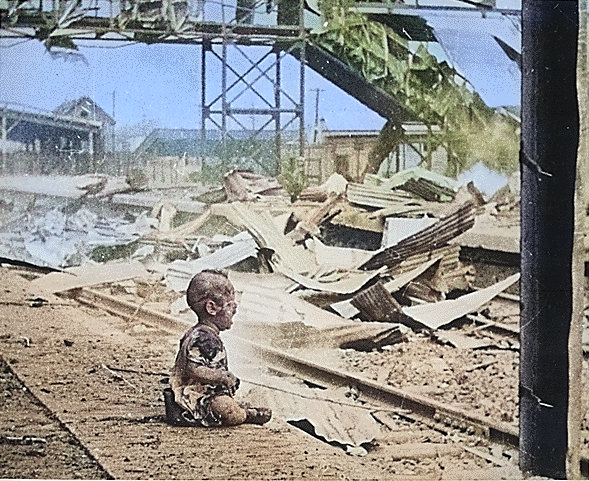 Injured Chinese toddler crying in the South Station in Shanghai, China, 28 Aug 1937, photo 1 of 2 [Colorized by WW2DB]