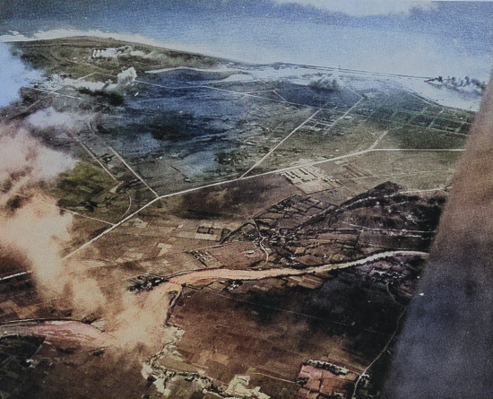 Karenko Airfield under attack by aircraft of USS Hancock, Taiwan, 12 Oct 1944, photo 2 of 2 [Colorized by WW2DB]