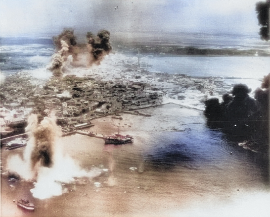 Mako harbor under USAAF B-25 bomber attack, Pescadores Islands, Taiwan, 4 Apr 1945, photo 2 of 2 [Colorized by WW2DB]