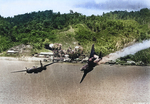 Douglas A-20G Havoc of the 387th Bomb Squadron trailing smoke and losing altitude after being damaged by anti-aircraft fire during an attack on Kokas, western New Guinea, 22 Jul 1944. Photo 2 of 4.