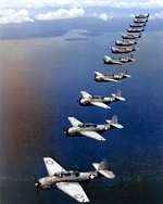 TBF-1 Avengers of Torpedo Squadron 10 from USS Enterprise fly in formation over Espiritu Santo, March 1943.