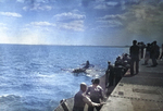 A TBM Avenger after a water landing beside the training aircraft carrier USS Sable on Lake Michigan, United States, 1944-45. Photo 2 of 2.