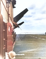 After an aborted landing, an F4F-4 Wildcat bolters around the island of the training aircraft carrier USS Wolverine on Lake Michigan, United States, 1943.