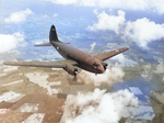 Curtiss C-46 Commando in flight, early 1943, probably over the United States.