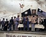 Major General D. L. Weart greeting General Tang Enbo during Double-Ten Day celebrations, Shanghai Race Course, Shanghai, China, 10 Oct 1945