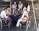 Surrender negotiations at Mili Atoll, Marshall Islands, aboard USS Levy, 19 Aug 1945; L to R: Cdr H.E. Cross, Majuro commander Capt H.B. Grow, LtCdr Toyda and Lt Hutsu, Lt Col G.V. Burnett (only cap showing), and others