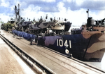 LST-1041 loaded with Higgins 78-foot PT-Boats (PT-626, PT-627, PT-628, & PT-634) in New Orleans, Louisiana, United States, Mar 1945. These boats were taken to Puget Sound where they were transferred to the USSR