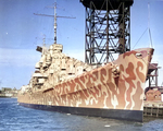 Cruiser Juneau coming alongside a pier at the New York Navy Yard in Feb 1942 prior to her commissioning. Note her modified Measure 12 paint scheme.