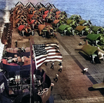 Flight deck of the USS Yorktown (Essex-class) crowded with aircraft, May 1943 in the Pacific. While he is not credited with this photo, this is probably a Charles Kerlee photograph.