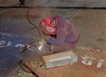 A welder working at Kaiser Richmond Shipyards, Richmond, California, United States, Feb 1943