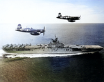 Two F4U-5N Corsair nightfighters of US Navy squadron VC-3 in flight over USS Boxer, off Korea, 4 Sep 1951; they were flown by Lt John Ely and Lt (jg) Stranlund