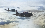 SBD Dauntless aircraft in flight back to USS Yorktown after an attack on Tulagi, Solomon Islands, 4 May 1942