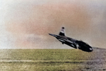 G4M1 bomber of Japanese Navy 4th Air Group commander Lieutenant Masayoshi Nakagawa, moments before crashing into sea during attack on USS Lexington off Bougainville, Solomon Islands, 20 Feb 1942. Photo 2 of 2