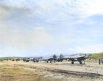 Line of P-38 Lightning escort fighters at Jackson Field, Port Moresby, New Guinea, 1942-1943