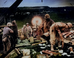 Men of US Marine Corps 4th Division shelling Japanese positions from the beach, Iwo Jima, Japan, Feb 1945