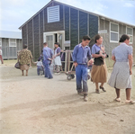 Japanese-American internees outside the canteen of Block 8 of Jerome War Relocation Center, Arkansas, United States, 17 Nov 1942