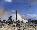 A group of US Marines observed as an aircraft above strafed Japanese positions ahead, Eniwetok, Marshall Islands, circa 18-21 Feb 1944