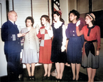 US Navy Cmdr. Thomas Gaylord administering oath to five new nurses commissioned in New York, United States, 8 Mar 1945; Phyllis Mae Dailey, USN