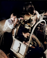 African-American factory workers working on the pilot compartment of an aircraft, United States, May 1942