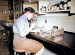 African-American US Army WAC Pfc Johnnie Mae Welton conducting a lab experiment in the serology lab at Fort Jackson Station Hospital, Fort Jackson, South Carolina, United States, 20 Mar 1944