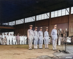 Douglas MacArthur at the induction ceremony of Philippine Army Air Corps, Zablan Field, Camp Murphy, Rizal, Philippine Islands, 15 Aug 1941; behind MacArthur, left to right: Richard Sutherland, Harold George, William Marquat, LeGrande Diller