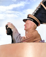 Fleet Admiral Chester Nimitz watching an anti-submarine weapons demonstration aboard destroyer USS Wiltsie in the Atlantic Ocean, 11 May 1946