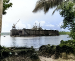 USS ABSD-1 with USS Cleveland in the dock, Espiritu Santo, New Hebrides, Jan 1944