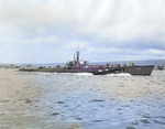 American submarine Apogon alongside a LCVP from LST 52, circa Feb 1946