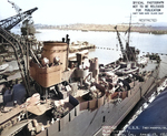 Indianapolis at Mare Island Navy Yard, California, view of her after half from port side, with light cruiser Raleigh in background, 19 Apr 1942