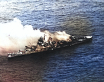 Mikuma burning after being bombed by Enterprise