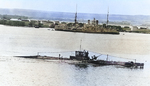 USS R-5 in Pearl Harbor, US Territory of Hawaii, 1920s; note minelayer USS Baltimore and minesweeper USS Sanderling in background