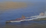 USS Rock underway, circa 1960s, photo 1 of 2