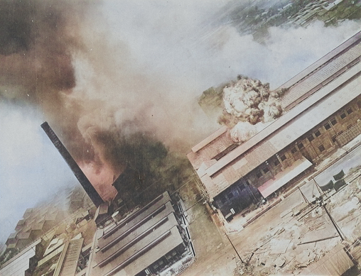 Kagi butanol plant under attack by B-25 bombers of 3rd Bombardment Group, USAAF 5th Air Force, Kagi (now Chiayi), Taiwan, 3 Apr 1945, photo 1 of 5 [Colorized by WW2DB]