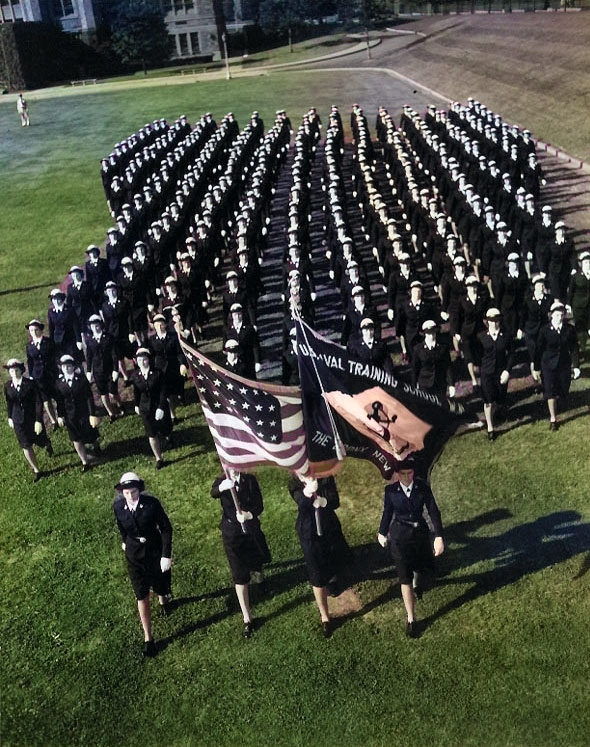 Trainees of US Naval Training Center, Hunter College, Bronx, New York, United States marching in formation behind their color guard, during WW2 [Colorized by WW2DB]