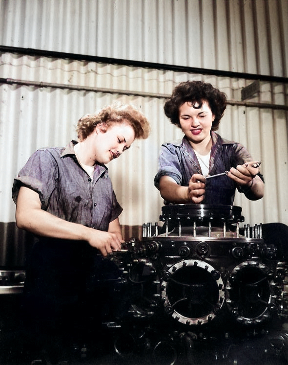 WAVES Seamen 2nd Class Elaine Olsen and Ted Snow learning how to take down a radial aircraft engine block, Naval Air Station, Lakehurst, New Jersey, United States, date unknown [Colorized by WW2DB]