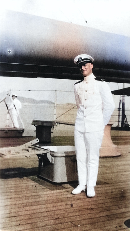 Ensign Burke posing by the 14-inch guns of USS Arizona, 1923 [Colorized by WW2DB]