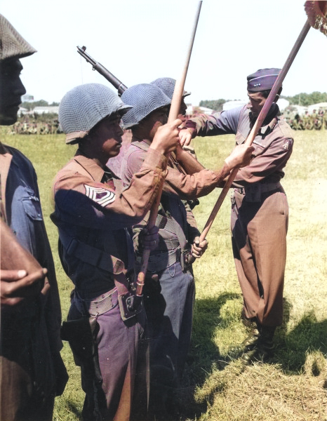 US 5th Army Lieutenant General Mark Clark pinning Presidential Distinguished Unit Citation ribbons to Japanese-American members of 100th Infantry Battalion, Vada area, Italy, 27 Jul 1944 [Colorized by WW2DB]