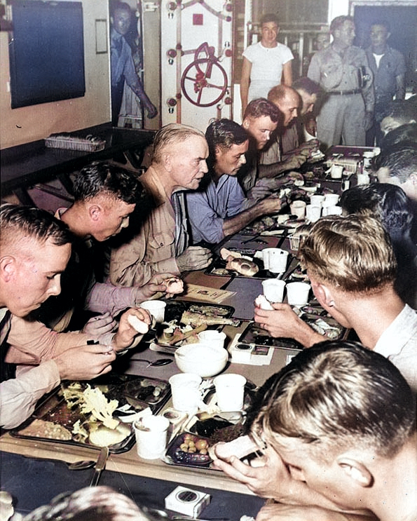 Admiral William Halsey having Thanksgiving dinner with the crew of battleship USS New Jersey, his flagship, 30 Nov 1944 [Colorized by WW2DB]