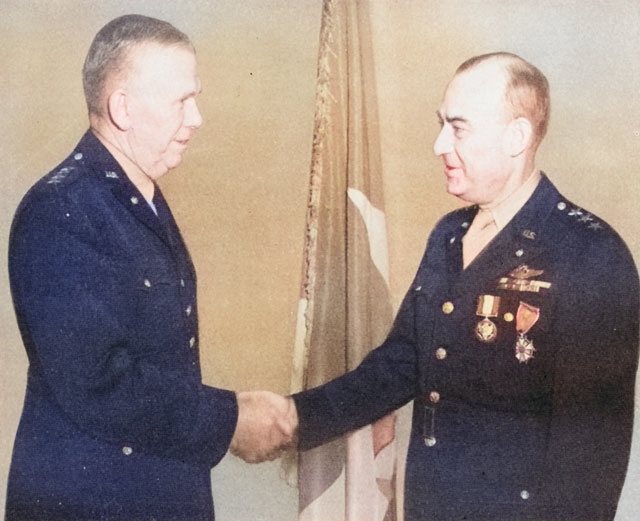 General George Marshall congratulates Lieutenant General Joseph McNarney after presenting him with the Distingushed Service Medal and the Legion of Merit, 1944 [Colorized by WW2DB]