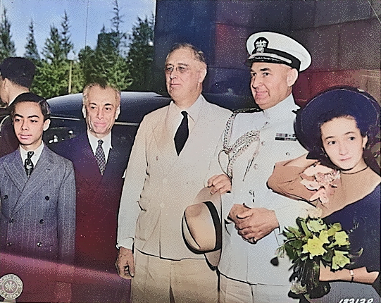 President Manuel Quezon (with family) and President Franklin Roosevelt (with Captain John McCrea), Washington DC, United States, 13 May 1942 [Colorized by WW2DB]