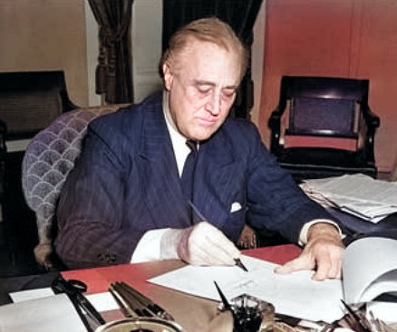 Roosevelt signing the Lend-Lease bill, 11 Mar 1941 [Colorized by WW2DB]