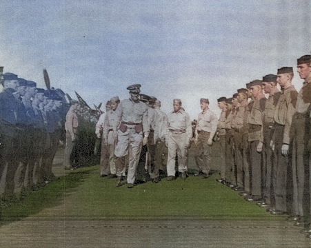 Captain George C. Montgomery inspecting USS Anzio, 16 Dec 1944, photo 2 of 2 [Colorized by WW2DB]