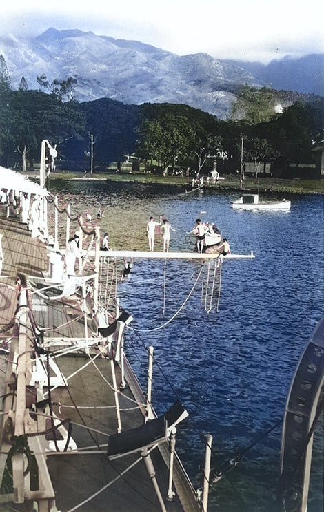 Chicago's crewmen enjoying 'swim call' at Papeete, Tahiti, during the cruiser's shakedown cruise, 1931 [Colorized by WW2DB]