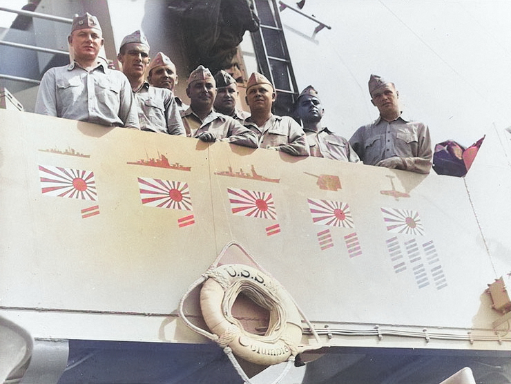 Plankowner officers of USS Columbia at the ship's bridge, late 1945. [Colorized by WW2DB]