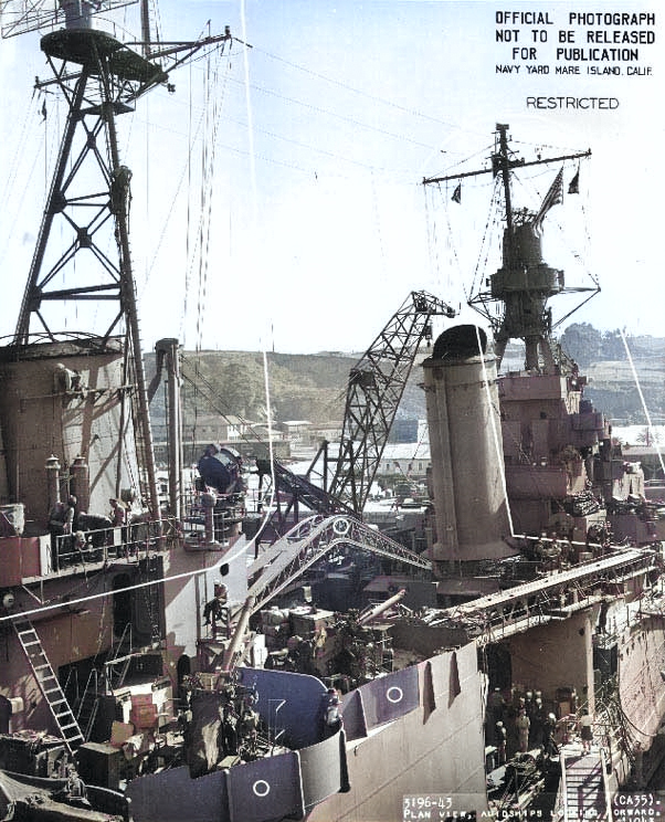 Indianapolis at Mare Island Navy Yard, California, view of her after starboard midships area, 1 May 1943 [Colorized by WW2DB]